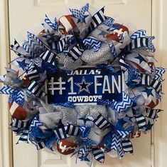 a football wreath with the number 1 fan on it