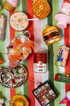 there are many different types of food on the table together, including donuts and hamburgers