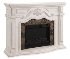 a white fireplace with a stone surround