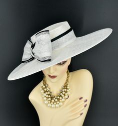 Note: The design of this hat, particularly the shallower crown, was crafted to create a unique aesthetic that suits some individuals perfectly. However, if you notice that the hat tends to slip, I would advise attaching an elastic strap to ensure a more secure and comfortable fit. ✿*.Key Features.*✿ This is a wide flat brim hat!! It's made of sinamay (3 layers ) and satin.  A nice sinamay bow is trimmed with satin ribbon too, very cool, one of my favorite hats! High quality. It's more beautiful in person! Great for Kentucky derby, weddings, church, Easter, Royal Ascot, horse races, cocktails, tea party, or any hat wearing occasion. Hat base size: From front to back: 19" (48cm) From left to right: 18.25" (46cm) Wide brim appr: 6" (15cm) Crown Depth: 3.5" (9cm) Hat girth: 21" (53.34cm). It f Easter Hat, Tee Party, Sinamay Fascinator, Royal Ascot Hats, Ascot Hats, Easter Hats, Hat Wedding, Church Hat, Flat Brim Hat