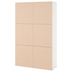 a white and beige cabinet with vertical slats on the front, against a white background