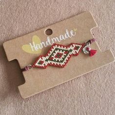 handmade beaded bracelet with tassels and beads in red, white and green