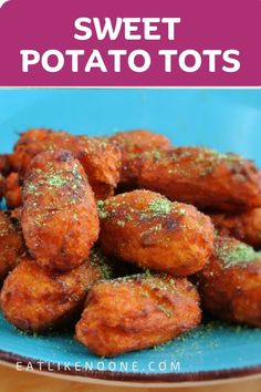 sweet potato tots on a blue plate with green sprinkles