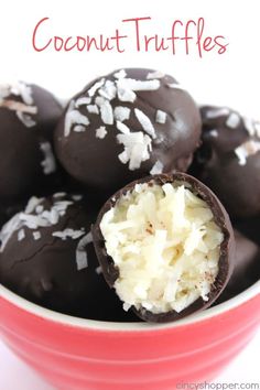 coconut truffles in a red bowl with white sprinkles