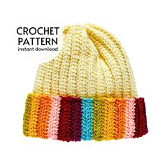 a crochet hat with different colors on the front and side, in white