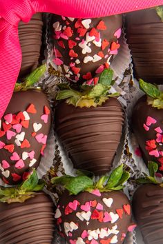 chocolate covered strawberries with pink and red hearts