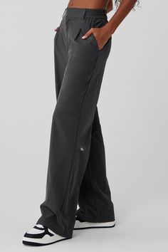 These trousers have “closet staple” written all over them. They have a high-rise waistband (flat in the front and stretchy in the back), classic details (belt loops and pleats) and a relaxed, wide-leg fit. Plus, they’re made from a lightweight, slightly stretchy fabric that looks sleek and feels totally comfortable. You'll go straight from work to your weekend plans with just a change of shoes. Masc Women Outfits, Alo Yoga Outfit, Gym Fashion Women, Tiktok Fits, Yoga Attire, Chanel Loafers, Masc Women, Jersey Trousers, Comfortable Pants