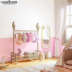 a child's bedroom with pink and white walls