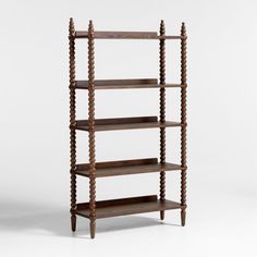 an old wooden shelf with four shelves