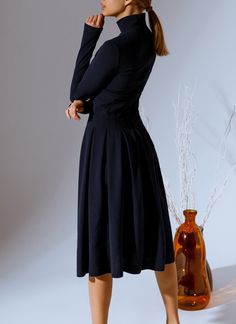 "Flared midi dress in dark blue shade: stand-up collar, long sleeve, cut-off waist with a pleated skirt in a wide pleat. Fabric: Polyester 97% Spandex 3% Closure: Invisible back zipper Back length: 106 cm chest waist hip S: 82-86cm 62-66cm 90-94cm (32.3-33.8\") (24.4-26\") (35.4-37\") M: 86-90cm 67-70cm 94-98cm (33.8-35.4\") (26-27.5\") (37-38.6\") L: 90-94cm 70-74cm 98-102cm (35.4-37\") (27.5-29.1\") (38.6-40.1\") XL: 94-98cm 74-78cm 102-106cm (35.4-38.6\") (29.1-30.7\") (40.1-41.7\") 2XL: 98-1 Blue Dress For Women, Spring Dress Casual, Blue Spring Dress, Blue Spring Dresses, Women Casual Wear, Blue Dresses For Women, Spring Midi Dress, Stylish Midi Dress, Dark Green Dress