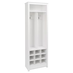 a tall white shelf with two open doors