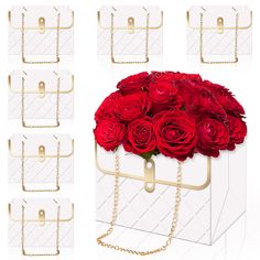 red roses in a white box with gold chains