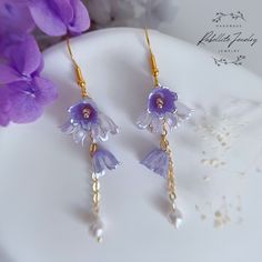 Chic pastel colours lily-of-the-valley dangling earrings  Handmade with 14k gold plated chains,ear wire, acrylic flower beads and faux pearls. Three different colours to choose from, you'll find the one that matches your pretty outfits  Makes great gift for your besties, yourself on Women's day and Mother's Day. Length approx 7cm-8cm Fairycore Jewelry, Cottagecore Earrings, Cottagecore Jewelry, Earring Long, Acrylic Flower, Long Tassel Earrings, Flower Beads, Pastel Colours, Pastel Hues