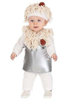 a baby dressed in a costume that looks like a lion with long hair and white pants