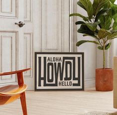 there is a sign that says aloha howdl hello on the floor