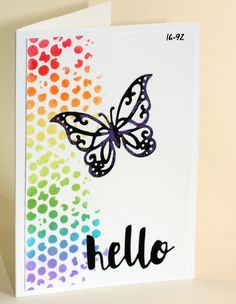 a colorful card with a butterfly on it