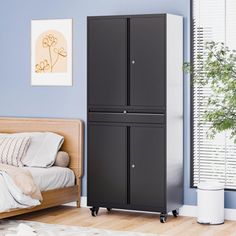 As well as being perfect for storing large quantities of items, the interior of this tall steel cabinet is designed to add extra space to any room, opening up your home. It is ideal for protecting your products from light exposure, temperature, dirt, and dust. It features a heavy-duty metal frame stabilizing and protecting the cabinet's contents. Whether you're storing office files, garage tools, or other large, heavy items, it's no problem. WFX Utility™ Finish: Black | WFX Utility™ Venilale Met Storage Cabinets, Garage Storage, Room Opening, Office Files, Being Perfect, Steel Cabinet, D Gray, Metal Cabinet, Garage Tools