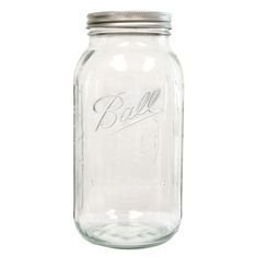 a glass jar with a metal lid and the word ball on it's side