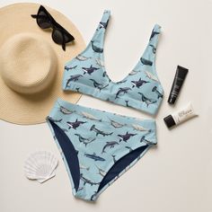 Make a splash all summer long with this one of a kind sustainable "Nautical Wahle & Hammerhead Shark High Waisted" bikini set. Enjoy the smooth fabric and the flattering design, and show it off at the beach or by the pool! Removable pads and its double-layer make it comfy to wear all day by the pool or beach. It's made from soft recycled polyester with double-layering and UPF 50+. * Soft and stretchy material with UPF 50+ * Sizes up to 6XL * Bikini top comes with removable padding for comfort * Shark Bathing Suit, Shark Swimsuit, Ocean Marine Life, Blue Party Decorations, Hammerhead Shark, Christmas Inspo, Cute Bathing Suits, Blue Party, Cute Swimsuits