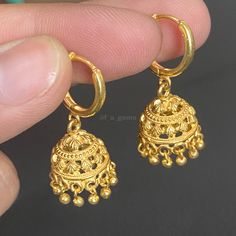 ● Item Detail :- Gorgeous Indian style Gold Jhumki earrings with hoops :- Super light weight :- 1.5 inches long  :- Colour : Gold :- hoops earring :- S SIZE JUMKA (Mini )  ( You can change the hook without any worry. We have three types of hooks,Leverbacks hook/Hoops/french hook , You can inform me about this by messaging me while placing the order. ) **important Notice** ~* After the order, give your full address, Pin code/zip code, Full name, Contact namber/email address, city/county name ● Delivery And Item Information :- * Item Will Be Shipped Within 24HOURE After Payment Cleared. * Customers Are Responsible For Duties And VAT Charged By Their Country Of Residence. * We Recommend You Contact Your Local Customs Office If You Have Questions About This. ●For More Information Contact Us On Gold Dual-tone Jhumkas For Ceremonial Occasions, Traditional Brass Jhumkas, Gold Dual-tone Temple Jewelry Jhumkas, Ceremonial Gold Dual-tone Jhumkas, Ornate Brass Jhumkas For Gift, Jumka Earrings, Gold Earrings Indian, Jhumki Earrings, Mini Earrings