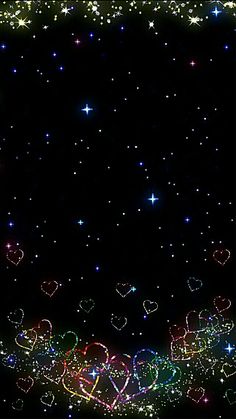 a black background with hearts and stars