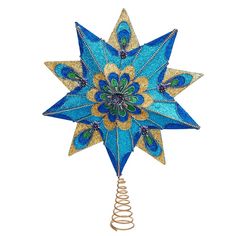 a blue and gold christmas ornament with spirals