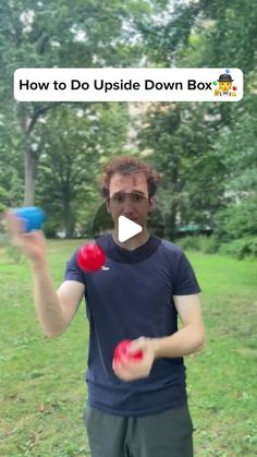 a man holding two red apples in his hands with the words how to do upside down box