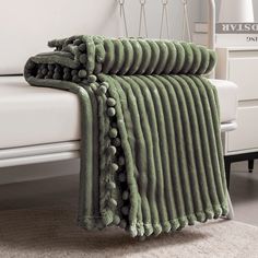 PRICES MAY VARY. 【Pompom & Strip Design】- Flannel fabric with pompoms fringe around the blanket, different color and white stripe pattern with 3D touching offers you amazing senses of softness. The fabulous color revives this blanket with an elegant appearance to complement your room a chic feeling. 【Soft & Lightweight】- The throw we offered is designed to be simple but elegant, this plush throw is super soft, durable, warm and lightweight. Fleece bed blanket brings you more breathable and light Green Throw Blanket, Green Blanket, Afghan Throw Blanket, Green Throw, Microfiber Blanket, Twin Blanket, Knit Throw Blanket, Couch Throws, Blanket Throw