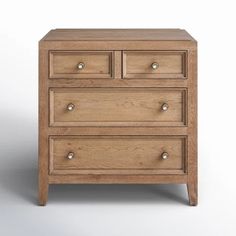 a wooden dresser with three drawers on one side and two small drawers on the other