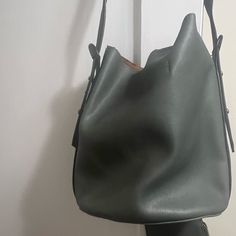 Beautiful Anthropologie Purse. Greenish/Grayish Color With An Attached Pouch Inside. Snap Closure. Never Worn But There Is *Very* Slight Fraying At The Rim Of The Bag (Barely Noticeable). Anthropologie, Anthropologie Purse, Grayish Color, Anthropologie Bags, The Bag, Snap Closure, Bag Lady, Pouch, Purse