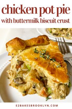 chicken pot pie with buttermilk biscuit crust on a white plate next to a fork