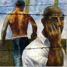 two men standing next to each other behind barbed wire