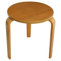 a small wooden table with one leg bent down and the other end turned upside down