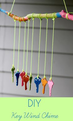 a mobile phone with an image of keys hanging from it's side and the text, make a wind chime out of old keys and acrylic paint