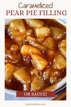 caramelized pear pie filling in a white bowl with cinnamon sticks on the side