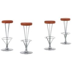 four stools with wooden seats and metal legs, all in different positions on a white background