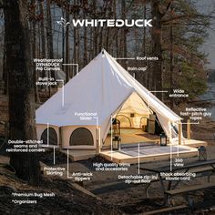 a white tent in the woods with information about it's contents and its features