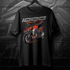 a black shirt with an orange motorcycle on it