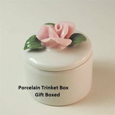 porcelain trinket box with pink flower on top