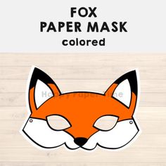 a paper mask with an orange fox's face on it and the words, fox paper mask colored