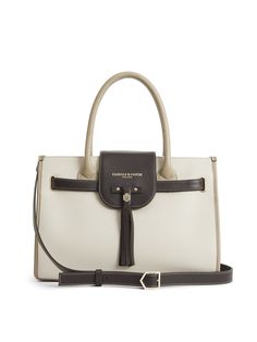 Available in an array of colours, the Windsor Handbag is our original icon. Wear over your shoulder or on your arm, to put the perfect finishing touch to your outfit. Complete with all the Fairfax & Favor design features you love, including the removable handbag tassel, shiny light gold chevron buckles and gold foil branded logo. Individually handcrafted in Europe, in an elegant mix of neutral coloured leathers, details include rolled drop-down leather handles, a removable shoulder strap and a f Work Travel Bag, Business Travel Bag, Fairfax And Favor, Tassel Purse, Tri Colour, Gold Chevron, Deck Shoes, Wellington Boots, Chelsea Ankle Boots