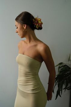 Introducing our elegant draped strapless dress, made with a heavyweight bamboo fabric. This dress features a ruched, draped waist band and a extra layer of fabric in the bust for that additional support within the bust and waist areas, to hug the body in the right places. This dress is the perfect mix of versatility, elegance & comfort, created with the slinkiest & softest bamboo material, making it the perfect staple across all seasons. Garment made with love in Melbourne/Naarm True to size Model is size 6 and wears size XS Bamboo Dress, Bamboo Material, Elegant Drapes, Swim Shop, Bamboo Fabric, Feminine Energy, Divine Feminine, New T, Top Dress