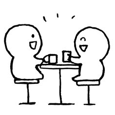 two people sitting at a table with their arms around each other