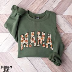 Mama Halloween Sweatshirt, Halloween Mama Shirt, Gift for Mom, Spooky Mom Crewneck, Coquette Halloween Sweatshirt For Mom, Cute Mama Shirt Ideal for any situation, a unisex heavy blend crewneck sweatshirt is pure comfort. These garments are made from polyester and cotton. This combination helps designs come out looking fresh and beautiful. The collar is ribbed knit, so it retains its shape even after washing. There are no itchy side seams on these sweaters. 50% cotton, 50% polyester Medium-heavy Fall Mama Sweatshirts, Fall Mom Shirts, Coquette Halloween, Mom Crewneck, Sweatshirt Halloween, Halloween Sweatshirt, Mama Shirt, Sew-in Labels, Mom Shirts