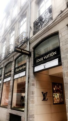 the store front of louis vuitton in paris