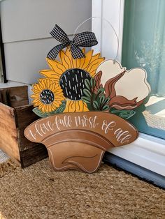 a wooden sign that says, i love fall most of time with sunflowers