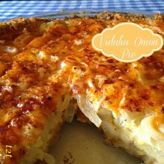 a close up of a pie on a plate with one slice missing from it's crust