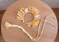 a wooden table topped with different types of hair accessories