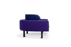 a purple and blue chair sitting on top of a white floor