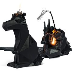 an origami horse candle holder is shown with the light on it's head